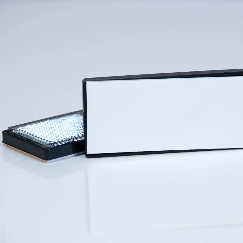 Reflectante rectangular 80 x 35 mm. blanco