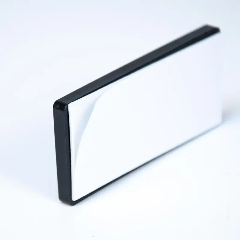 Reflectante rectangular 80 x 35 mm. blanco