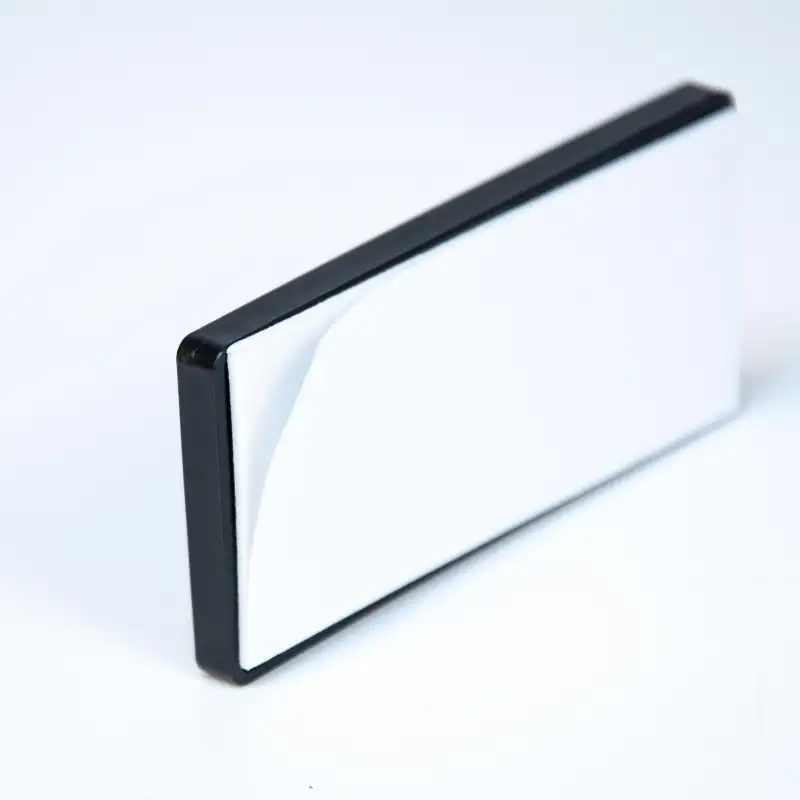 Reflectante rectangular 80 x 35 mm. blanco